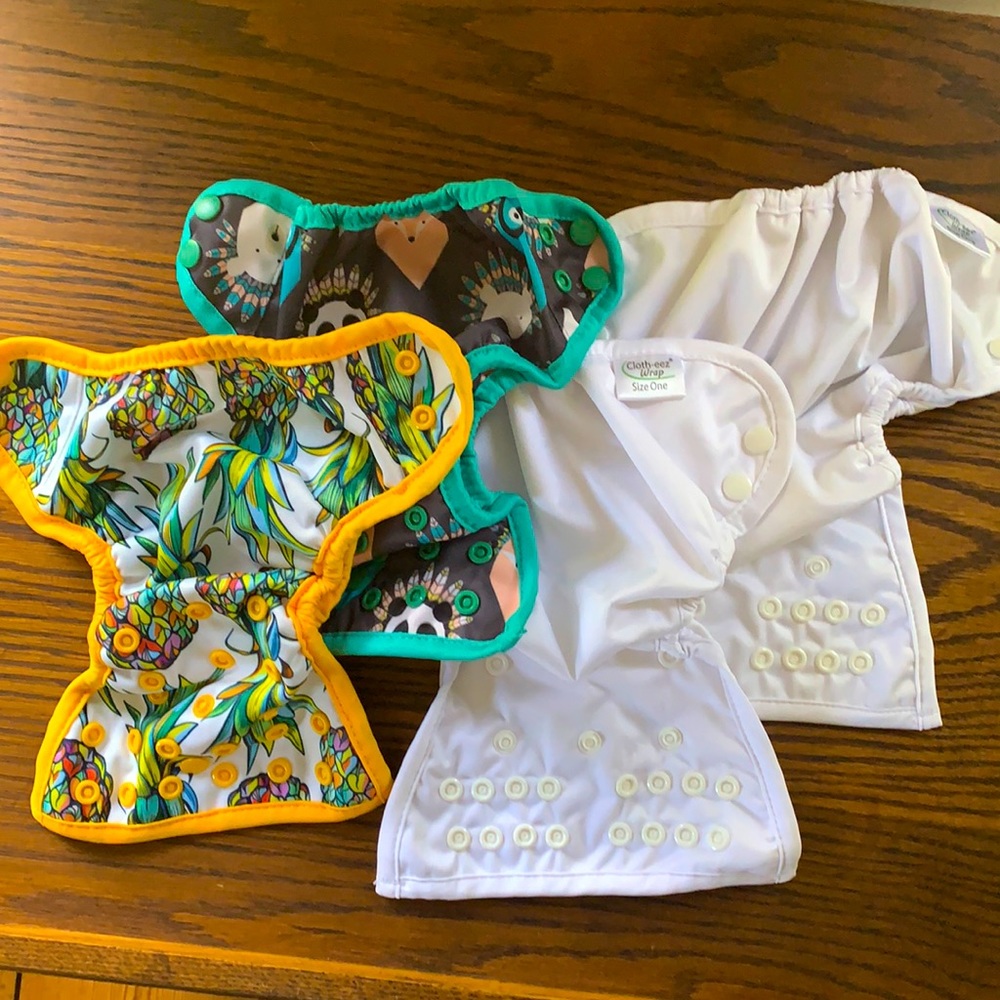 Lot of four reusable diaper covers